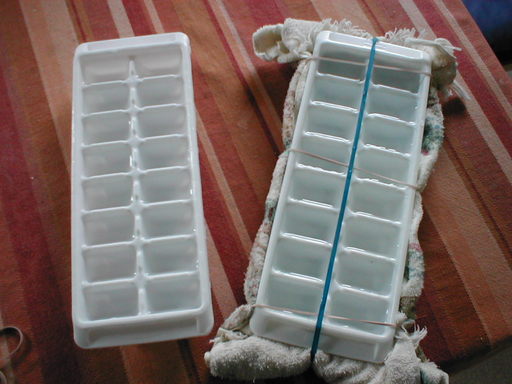 two trays, one of them with a towel-nest
